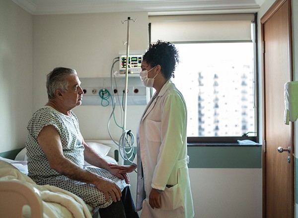 Nurse Speaking to Patient 